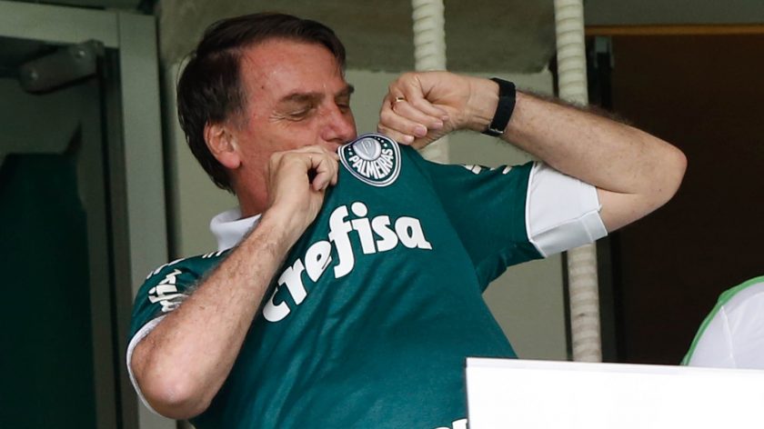 SAO PAULO, BRAZIL - DECEMBER 02: The new president elected Jair Bolsonaro waves to the fans before the match between Palmeiras and Vitoria for the Brasileirao Series A 2018 at Allianz Parque Stadium on December 02, 2018 in Sao Paulo, Brazil. (Photo by Alexandre Schneider/Getty Images)